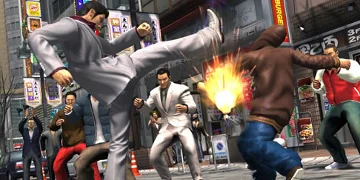 A fight involving a group of people, in the middle of a street