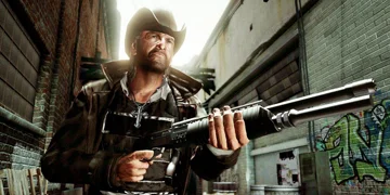 A bearded male character with a shotgun