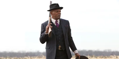Samuel L. Jackson Holding Shotgun